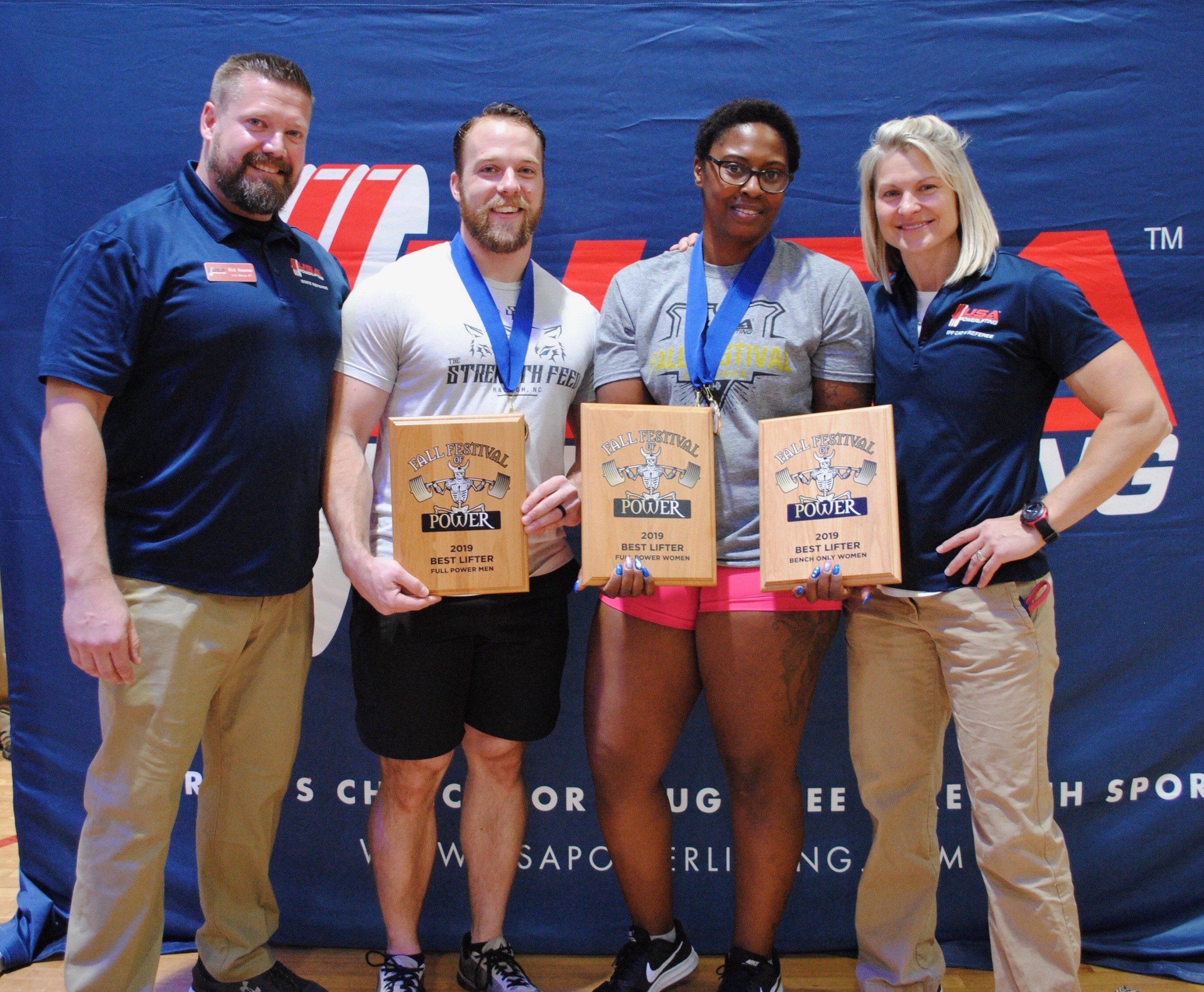 USAPL NC Co-Chairs - Nick Hammer & Jennifer Thompsonp presenting Best Lifter awards to Kevin Woods & Michelle Jordan at USAPL Fall Festival 2019 in Denver, NC